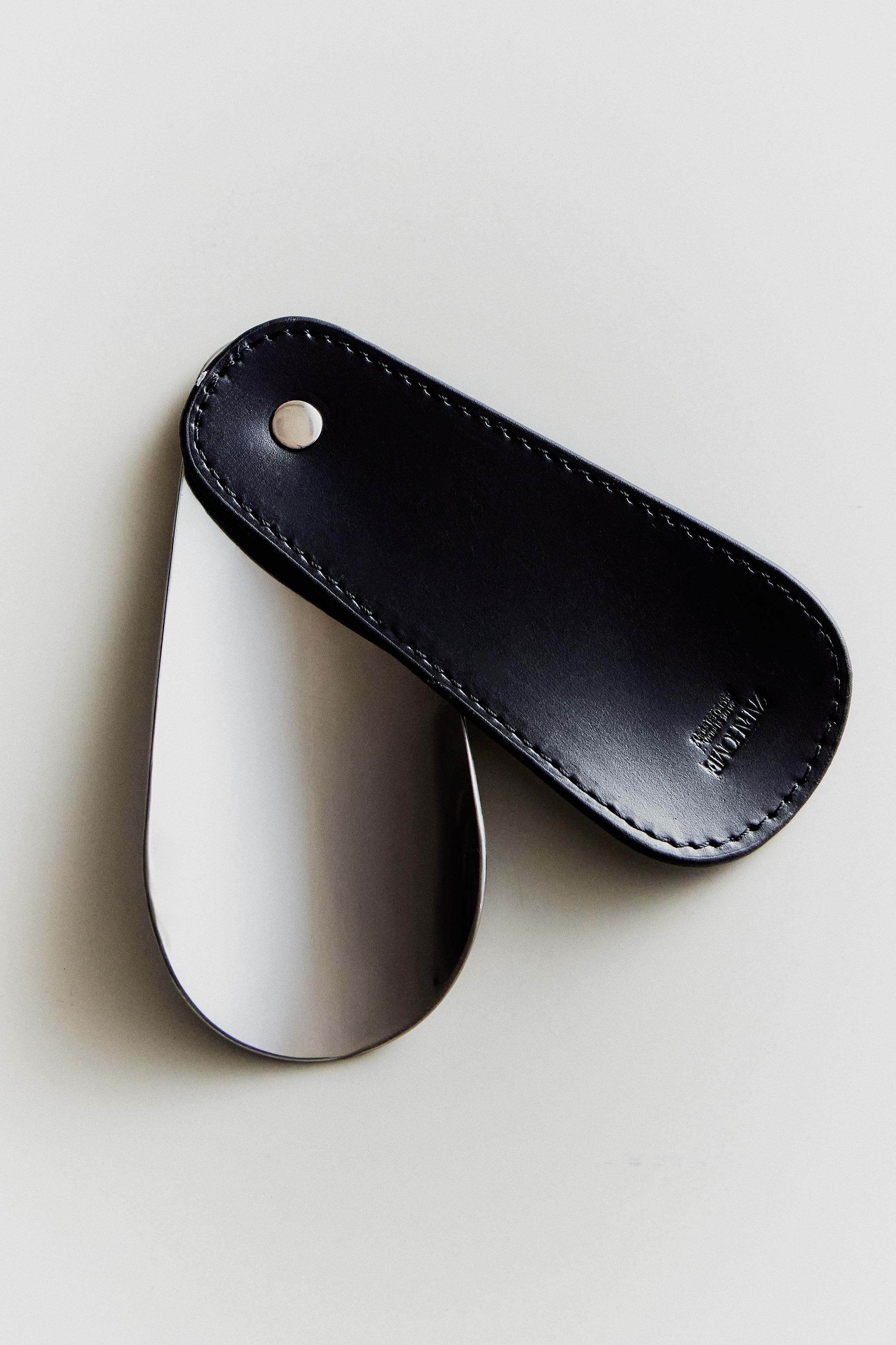 CHAUSSE-PIED DE VOYAGE ACIER ET CUIR